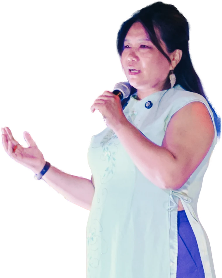 Nandar Matari speaking on stage